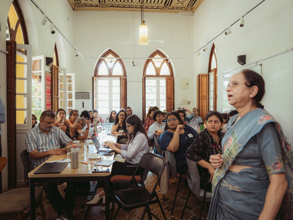 A speaker addressing participants at the Brainstorming Lab